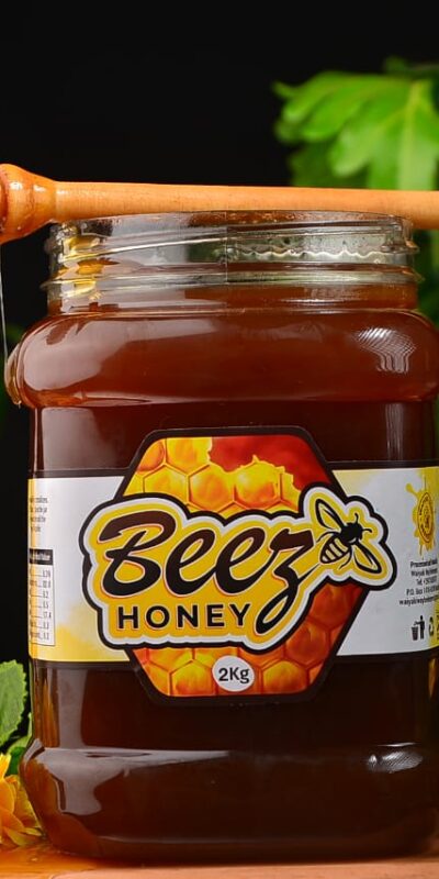 beez honey 2kg semi-refined honey in a plastic jar