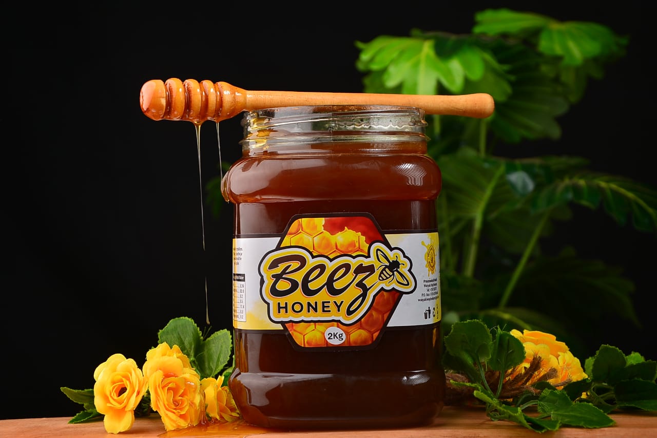 beez honey 2kg semi-refined honey in a plastic jar